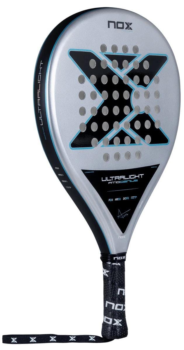 The NOX AT10 Genius Ultralight By Augustin Tapia 2025 padel racket features a silver and black design with a bold "X," HR2 core, perforated holes, "Ultralight" branding, black grip tape on the handle, and an attached wrist strap.