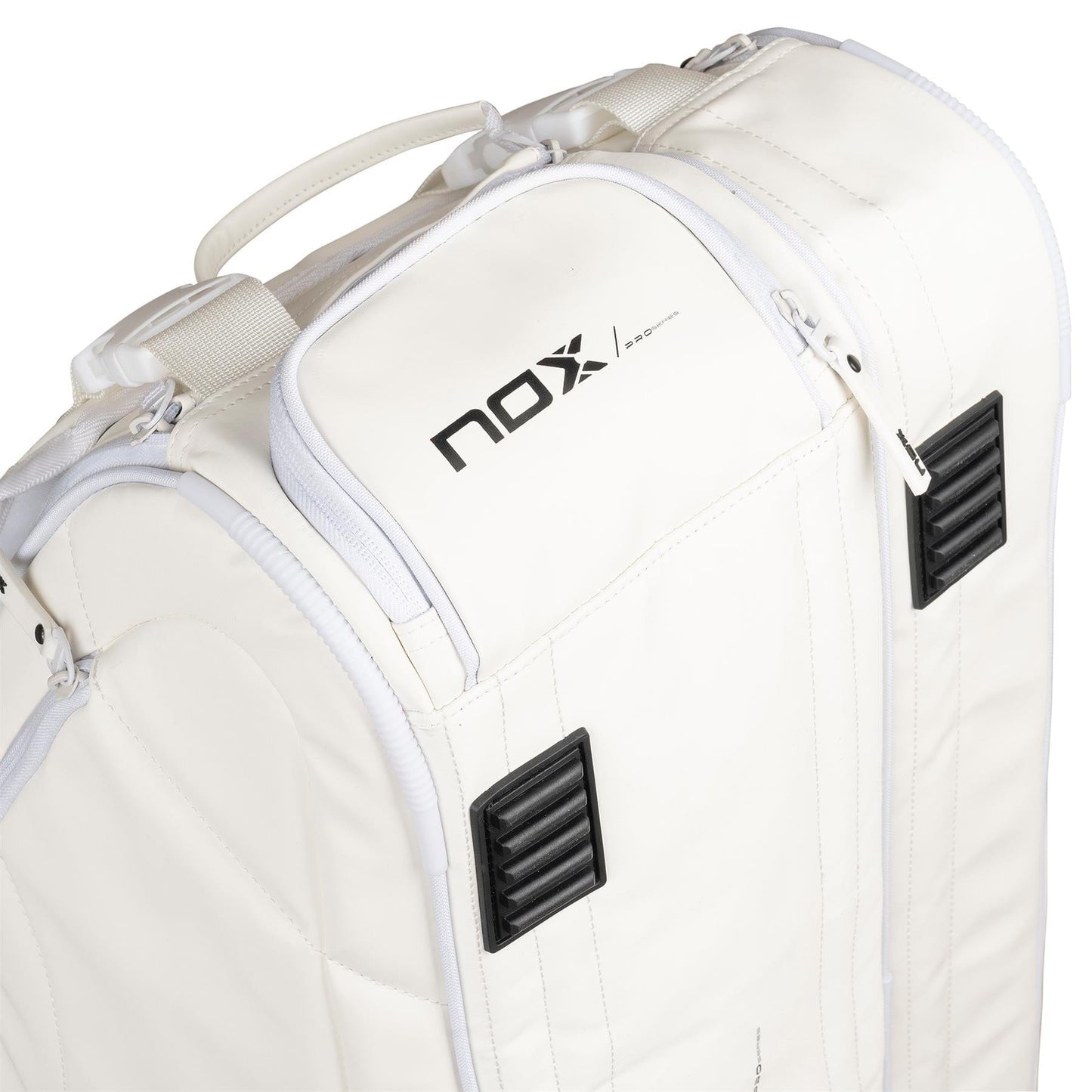 Close-up of the NOX Pro Series Padel Racket Bag in white, featuring a handle, black accents, "NOX" logo on top, 45L capacity, zippers, and textured black vents on the corners.