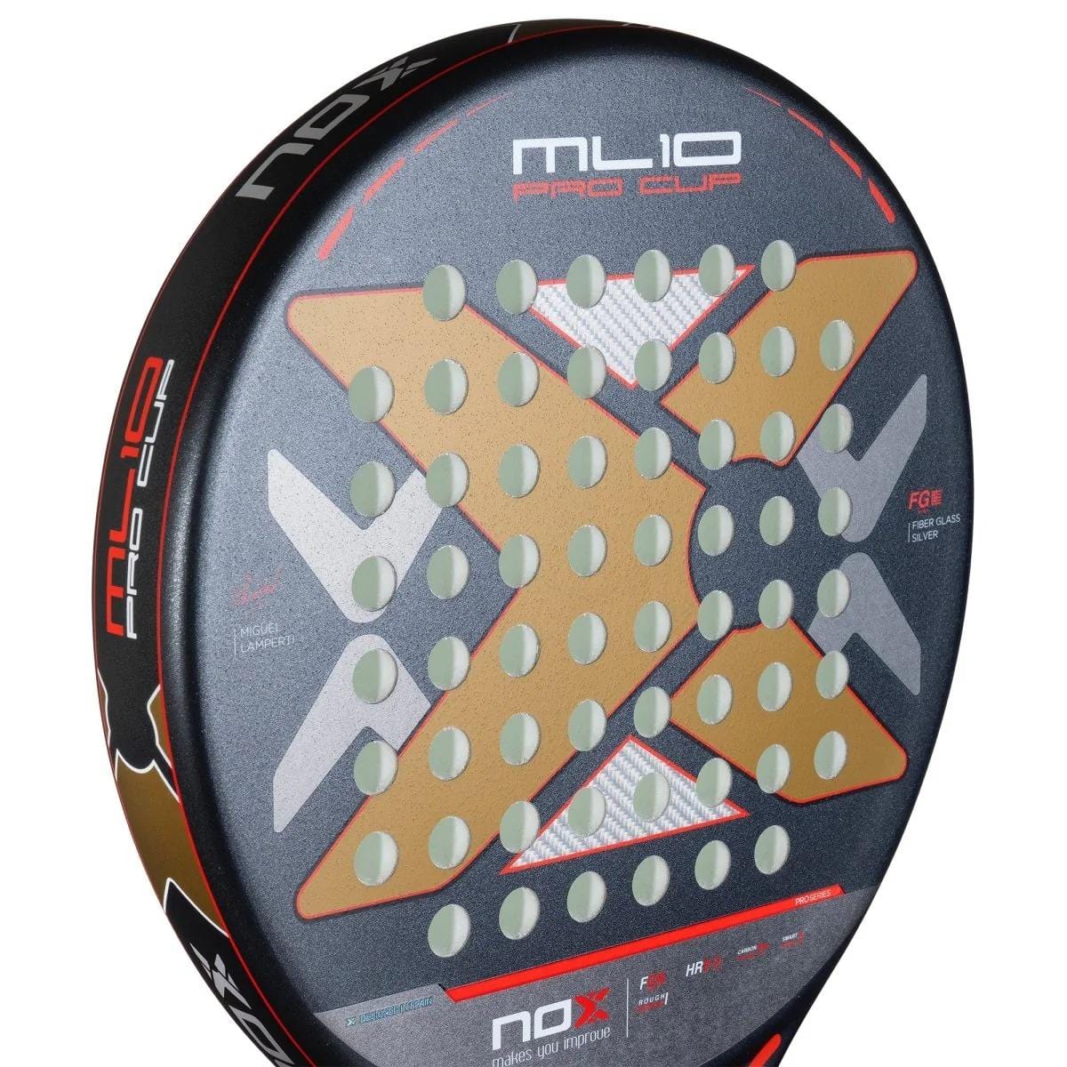 Close-up of the NOX ML10 Pro Cup Rough Surface By Miguel Lamperti 2025 Padel Racket, showing a gold "X" on its black face with circular holes, red and white NOX branding, a Rough Surface texture, and Smartstrap® System along the frame.