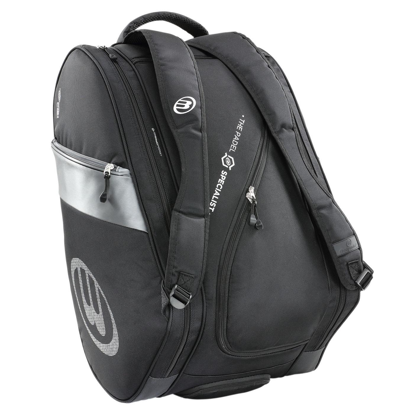 The Bullpadel Neuron 25 Padel Racket Bag in black is perfect for padel enthusiasts, featuring multiple compartments and two straps. A small front logo reads "The Padel Specialist" in white, making it ideal for your Flow Padel Racket.