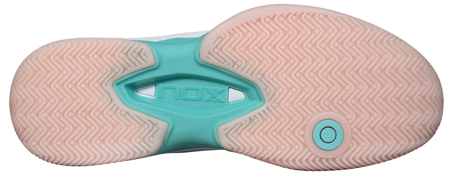 The image shows the sole of the NOX AT10 Lux Women's Padel Shoes in White/Potpurri. Designed by NOX, it features a herringbone pattern and "NOX" embossed at the center, offering excellent traction for power play on the padel court.