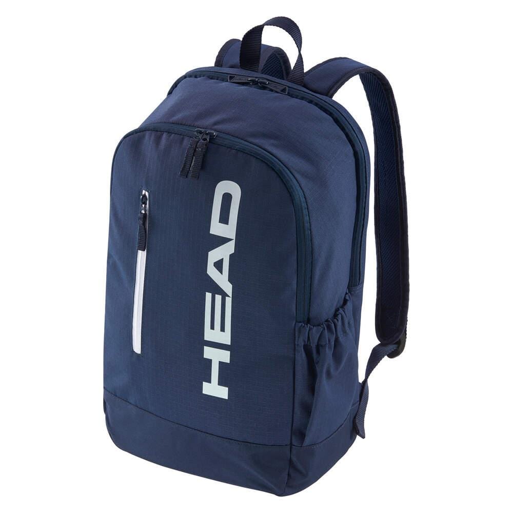 The HEAD BASE Padel Backpack 17L - Navy features a new design with a large front pocket, vertical zip pocket, two side pockets, adjustable padded straps, and a dedicated racket compartment. "HEAD" is printed vertically in white on the front.