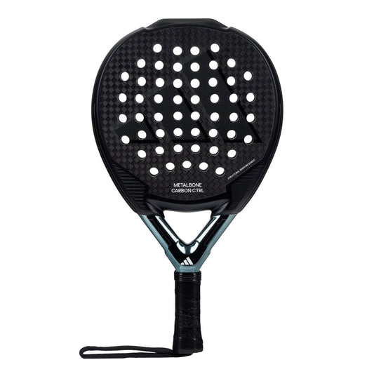 The ADIDAS Metalbone Carbon CTRL 3.3 Padel Racket in black by adidas boasts a teardrop shape with a 6K Carbon pattern, white circular holes, and a black handle with a wrist strap—ideal for players seeking precision and strength on the court.