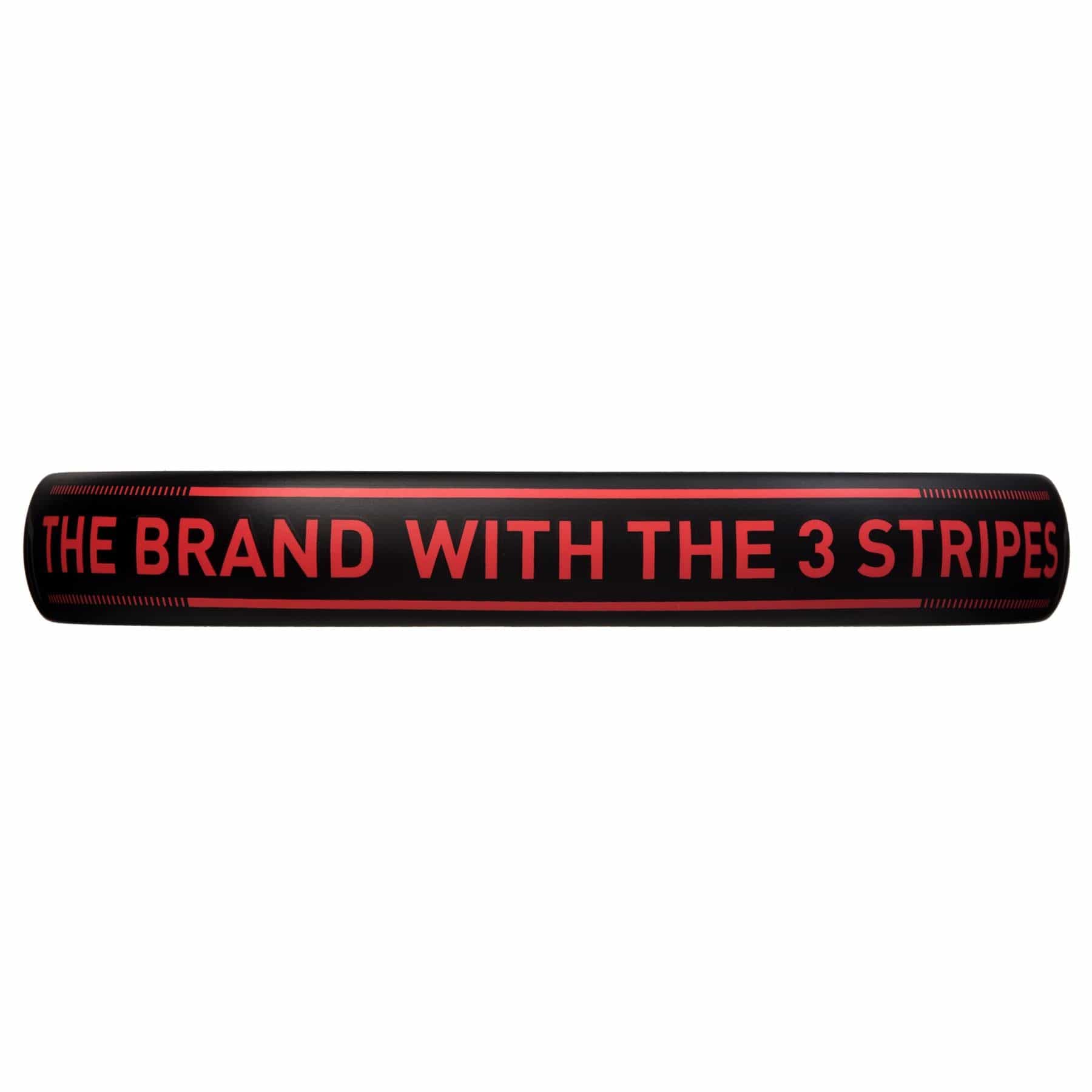 The ADIDAS Match 3.3 Padel Racket is a black fiberglass cylindrical object featuring red text that reads "THE BRAND WITH THE 3 STRIPES" along its side, making it ideal for beginner padel players.