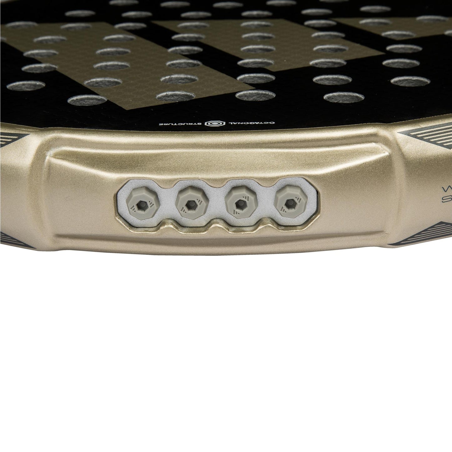 The ADIDAS Metalbone CTRL 3.4 Padel Racket - Gold by adidas features a close-up of the handle area, showcasing three hexagonal, screw-like details. Its black surface is adorned with an Octagonal Structure and precisely patterned round holes.