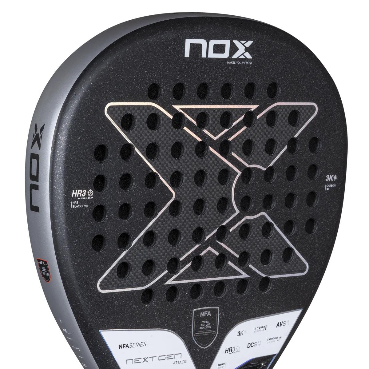 Close-up of the NOX NFA Nextgen Pro Attack 3K padel racket by NOX, featuring a textured black face with round holes and a sleek silver geometric design; model name and specs are visible on the racket’s face and edge.