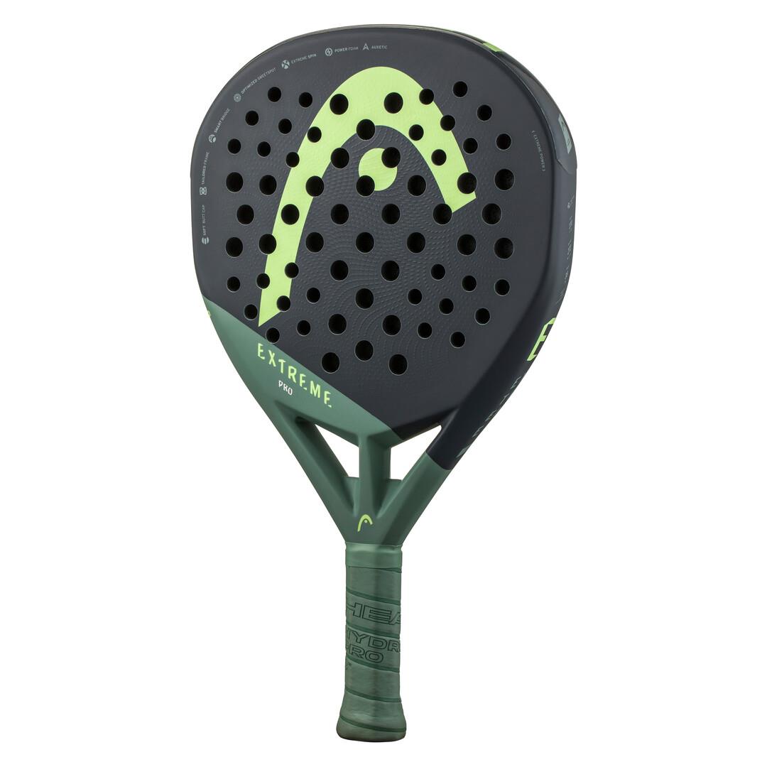 The HEAD Extreme Pro 2023 Padel Racket - Green features a sleek black and neon green design with "EXTREME PRO" prominently displayed. Its matching green grip complements the face, which boasts Auxetic technology and multiple round holes for peak performance.