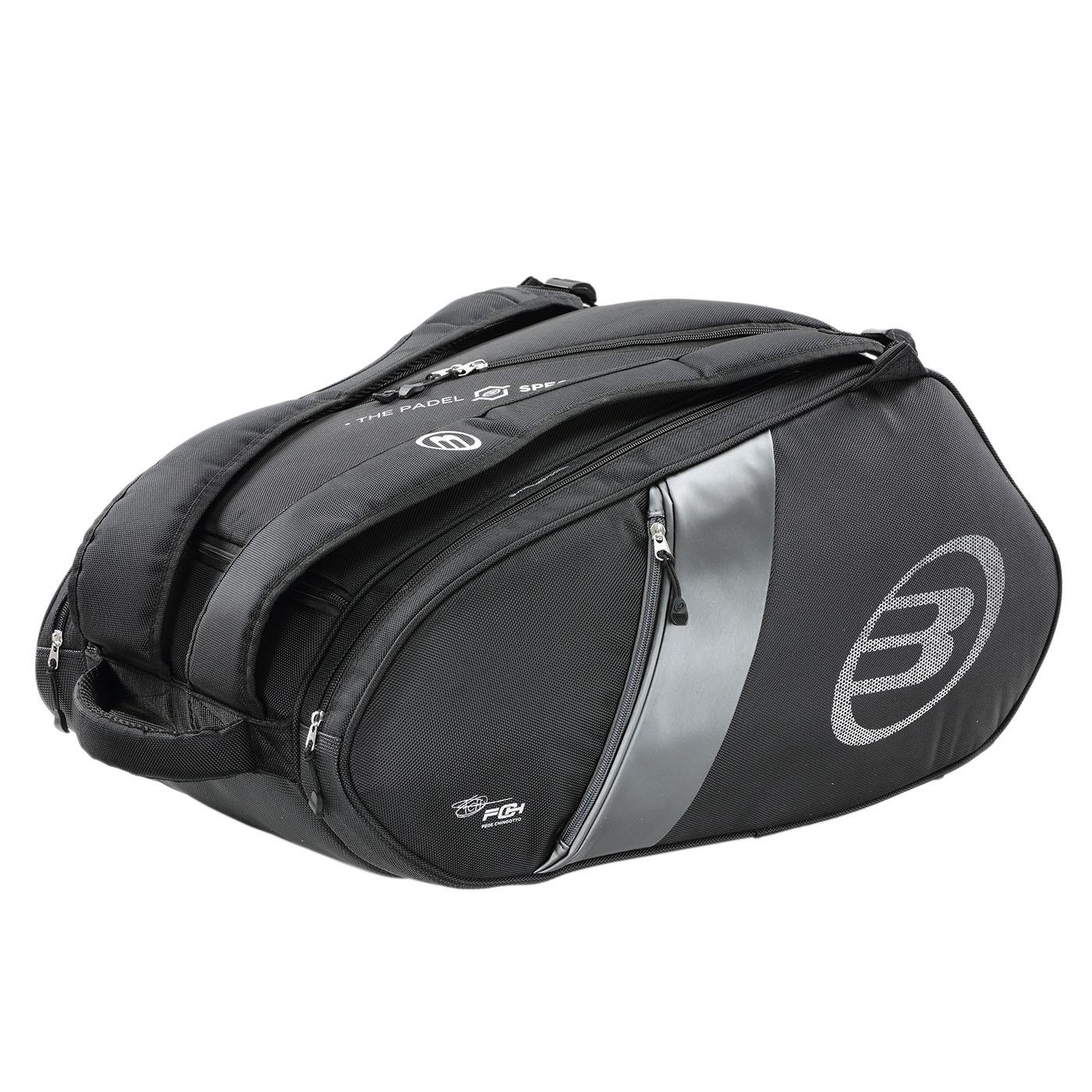 The Bullpadel Neuron 25 Padel Racket Bag in black has a large main compartment, padded straps for comfort, and a side zipper pocket. The Bullpadel logo enhances its sporty elegance.