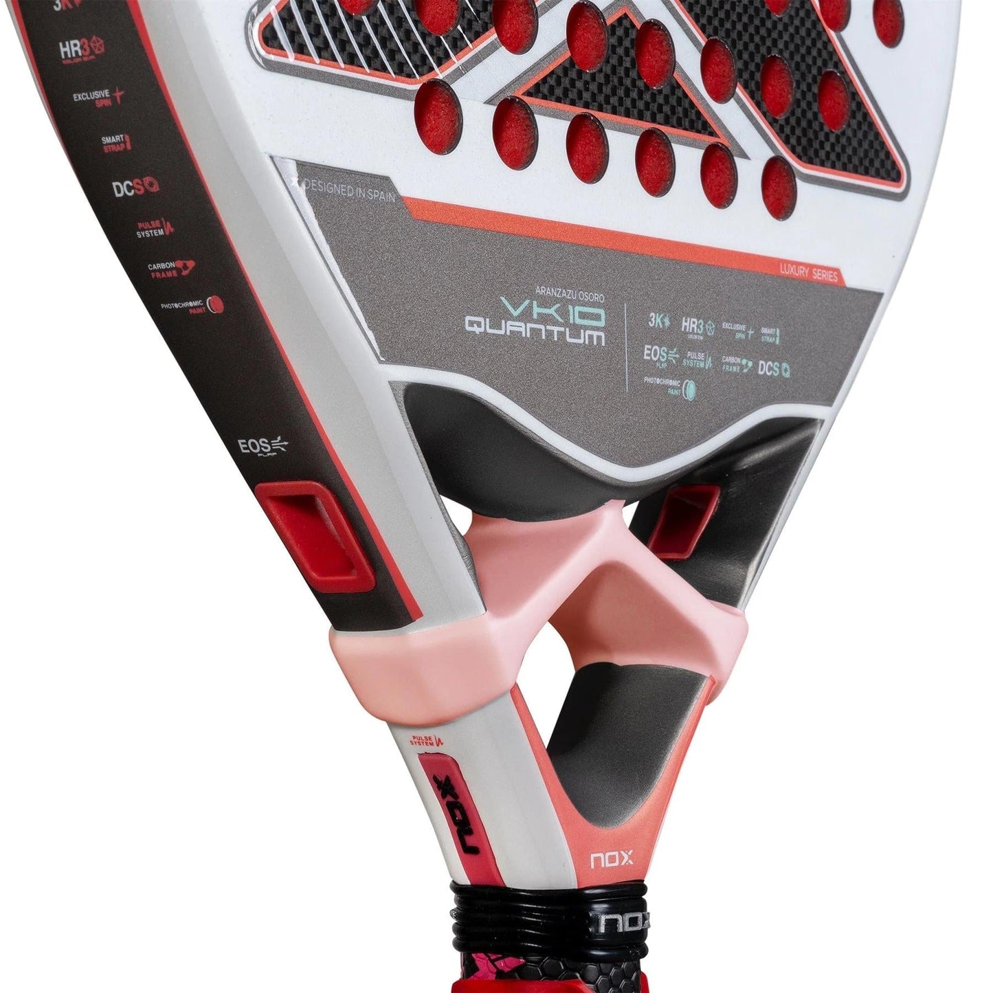 Close-up of the NOX Luxury VK10 Quantum 3K By Aranzazu Osoro 2025 Padel Racket, showcasing its modern red, black, and white design, prominent NOX branding, and unique Quantum 3K holes on the striking surface.