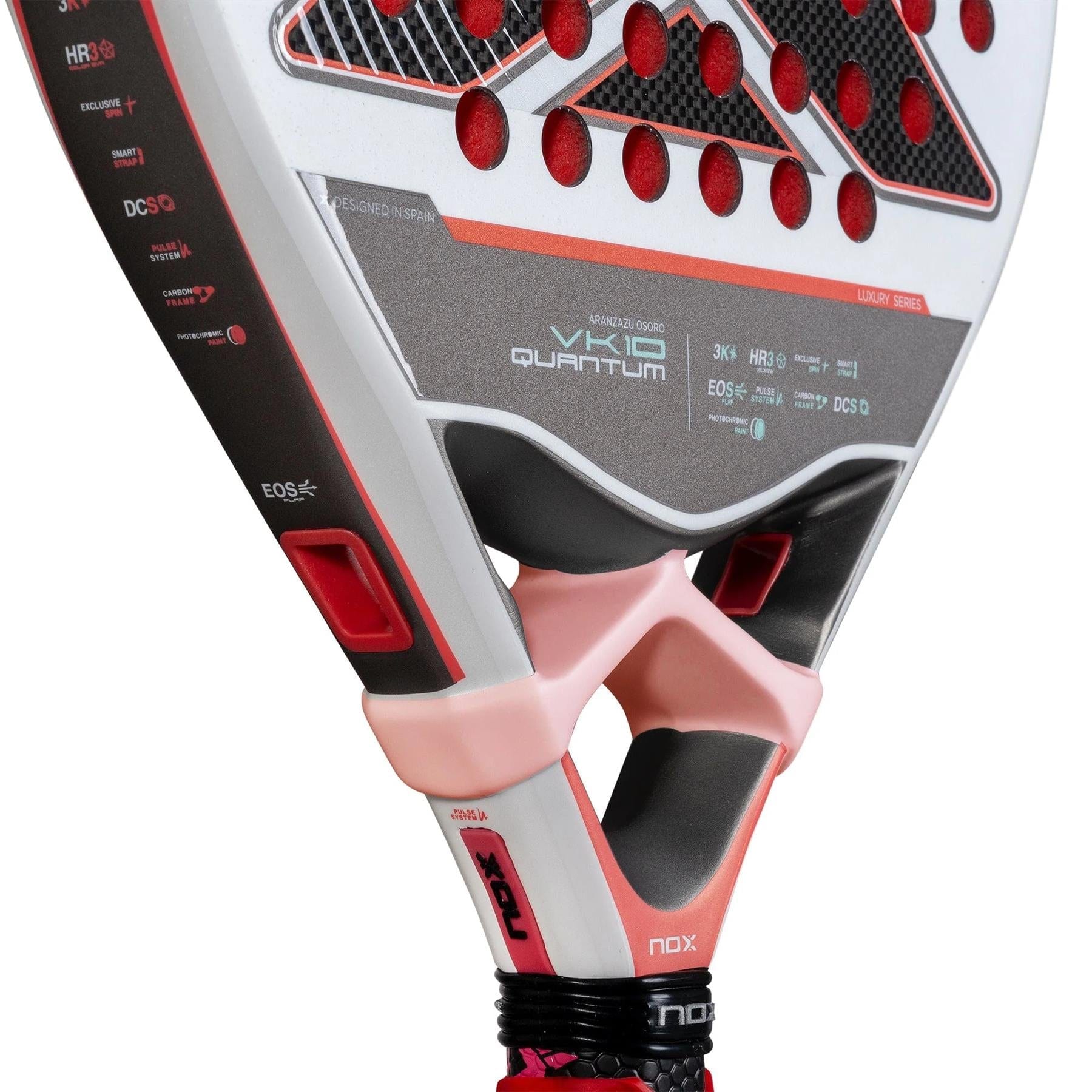 Close-up of the NOX Luxury VK10 Quantum 3K By Aranzazu Osoro 2025 Padel Racket, showcasing its modern red, black, and white design, prominent NOX branding, and unique Quantum 3K holes on the striking surface.