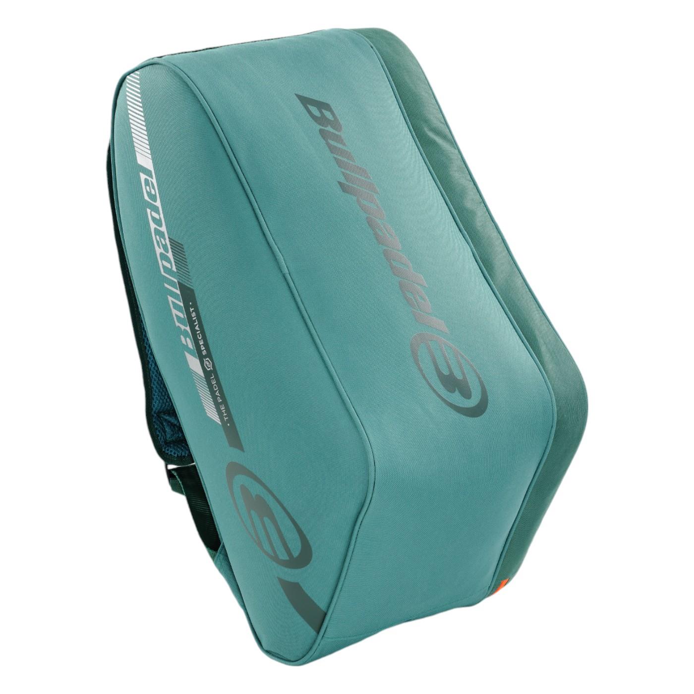 The Bullpadel Tour 25 Padel Racket Bag in teal offers a streamlined, lightweight design with the Bullpadel logo in gray. It includes a side zipper, mesh pocket, and a padded racket compartment for ultimate protection and convenience.