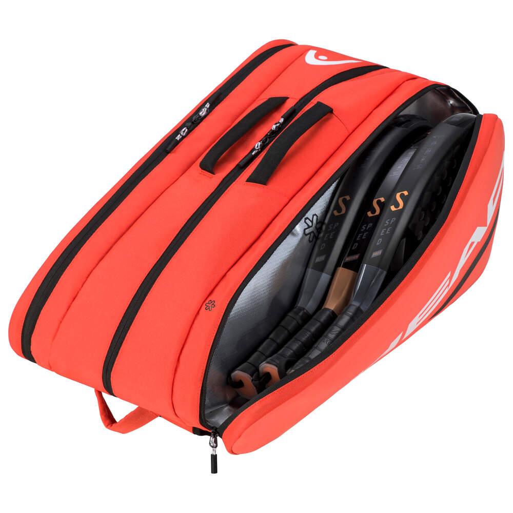A HEAD Tour Padel Bag L in Fluo Orange, with its multiple compartments slightly open, displays several tennis rackets inside. It includes CCT+ climate control and zippers, and features a handle on top for convenient transport.