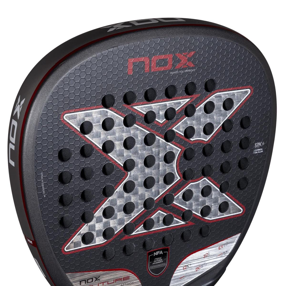 Close-up of the NOX NFA Future Attack 12K Alum Padel Racket in black/red, featuring Carbon 12K construction for power, a large X design, circular perforations, and red and white accents on its textured face.
