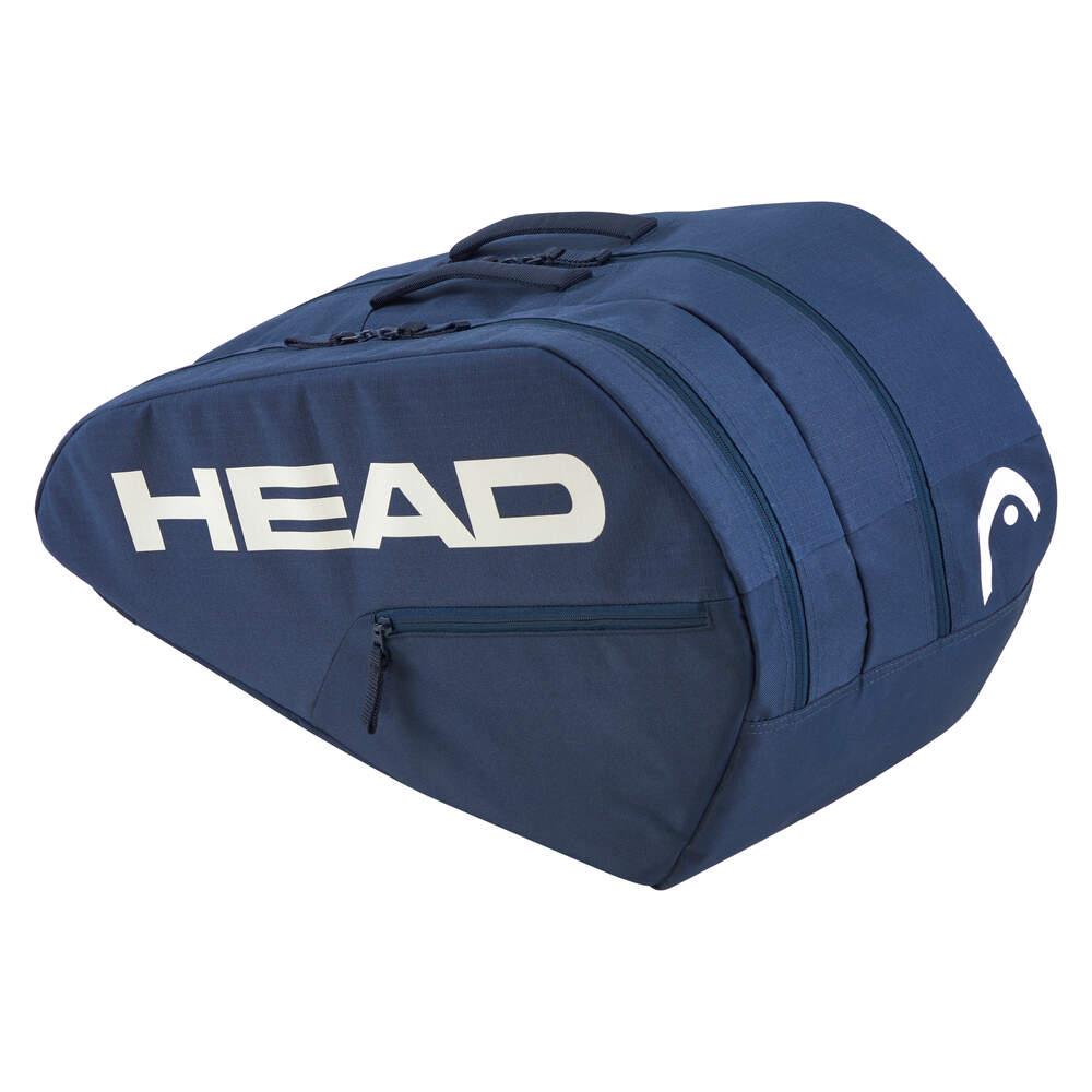 The HEAD Base Padel Racket Bag M - Navy displays a large WHITE "HEAD" logo, features accessory pockets, reinforced construction, multiple zippers, and a top handle. It securely holds all your tennis or padel gear.