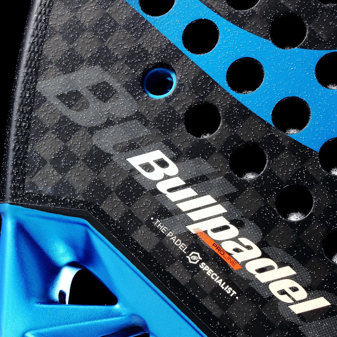 Close-up of the Bullpadel Vertex 05 Hybrid 2026 Padel Racket in black and blue, showing its textured carbon fiber surface with small holes, hybrid shape, and white Bullpadel branding.