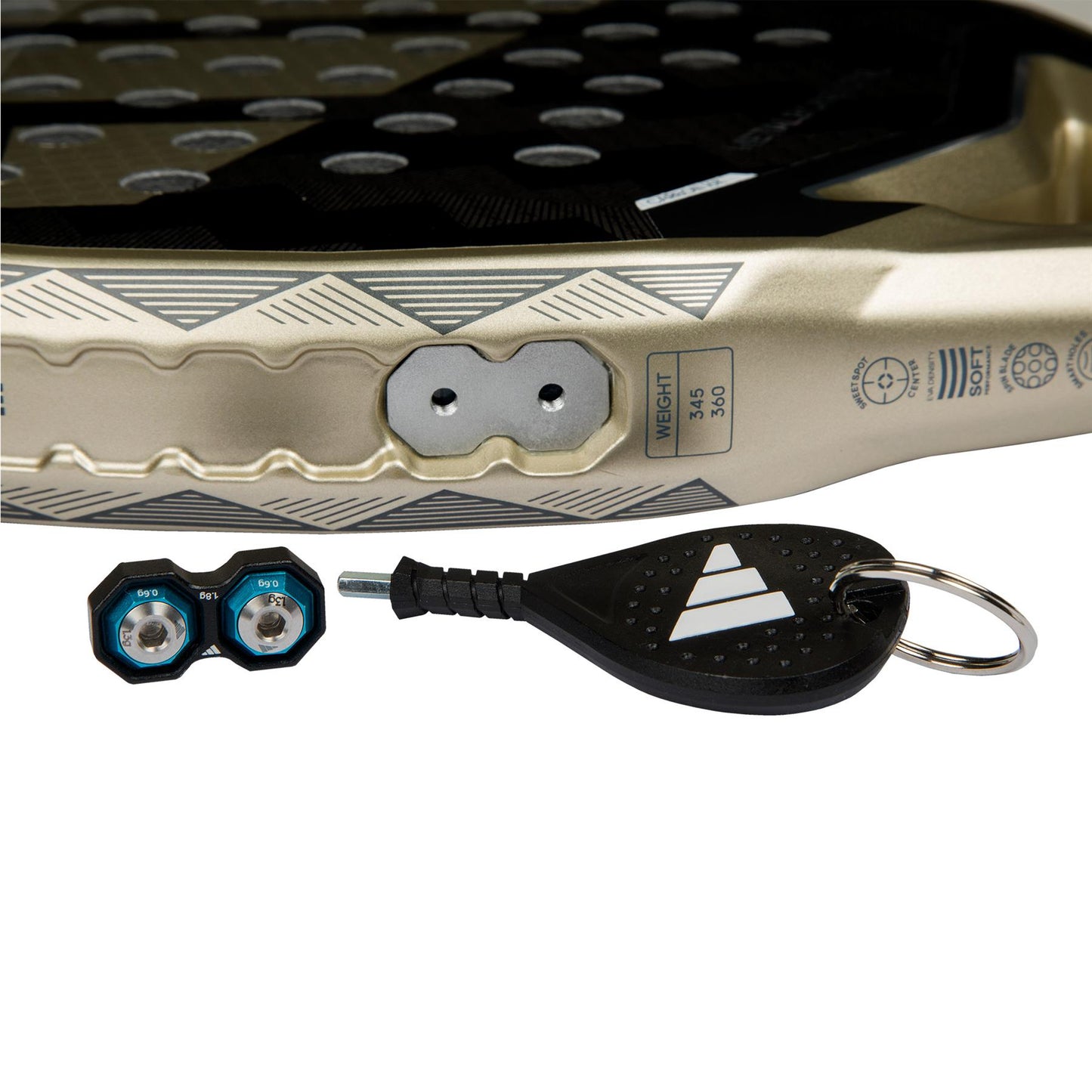 Close-up of the ADIDAS Metalbone CTRL 3.4 Padel Racket, Gold edition by adidas, featuring a textured surface, dual detachable weights with an Allen key for its Weight & Balance System. An octagonal structure provides precision, while the logo and weight specs are displayed on a keychain.