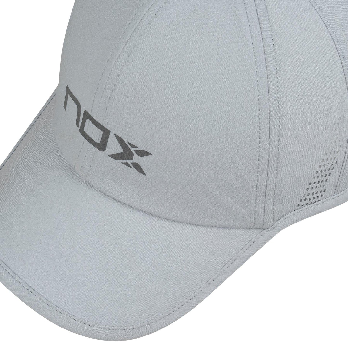 A close-up of the NOX Padel Cap - Grey by NOX, featuring stitched panels, side ventilation holes, and an adjustable velcro strap. "nox" and an "X" logo are printed in gray on the front panel for comfort and sun protection.