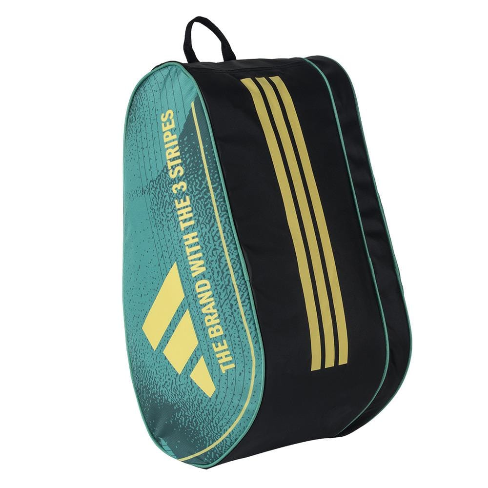 The ADIDAS Control 3.4 Padel Racket Bag, in teal and black with gold diagonal stripes, is perfect for court accessories. It features "THE BRAND WITH THE 3 STRIPES" in gold on the teal area and includes a black top handle for easy carrying.