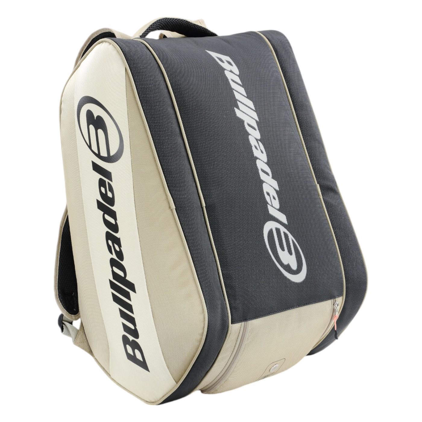 The Bullpadel Vertex 25 Padel Racket Bag in stone is a technical padel racket bag with reinforced thermo-lined compartments for your racket and sports gear. It features a padded design for protection, and is adorned with the Bullpadel logo and text.