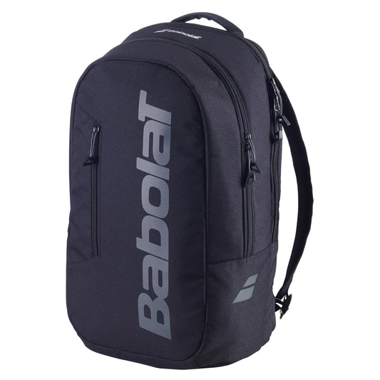 The Babolat Court Lite Padel Backpack - Black by Babolat features gray zippers, bold vertical "Babolat" branding, multiple zippered compartments including a racket compartment, and adjustable shoulder straps.