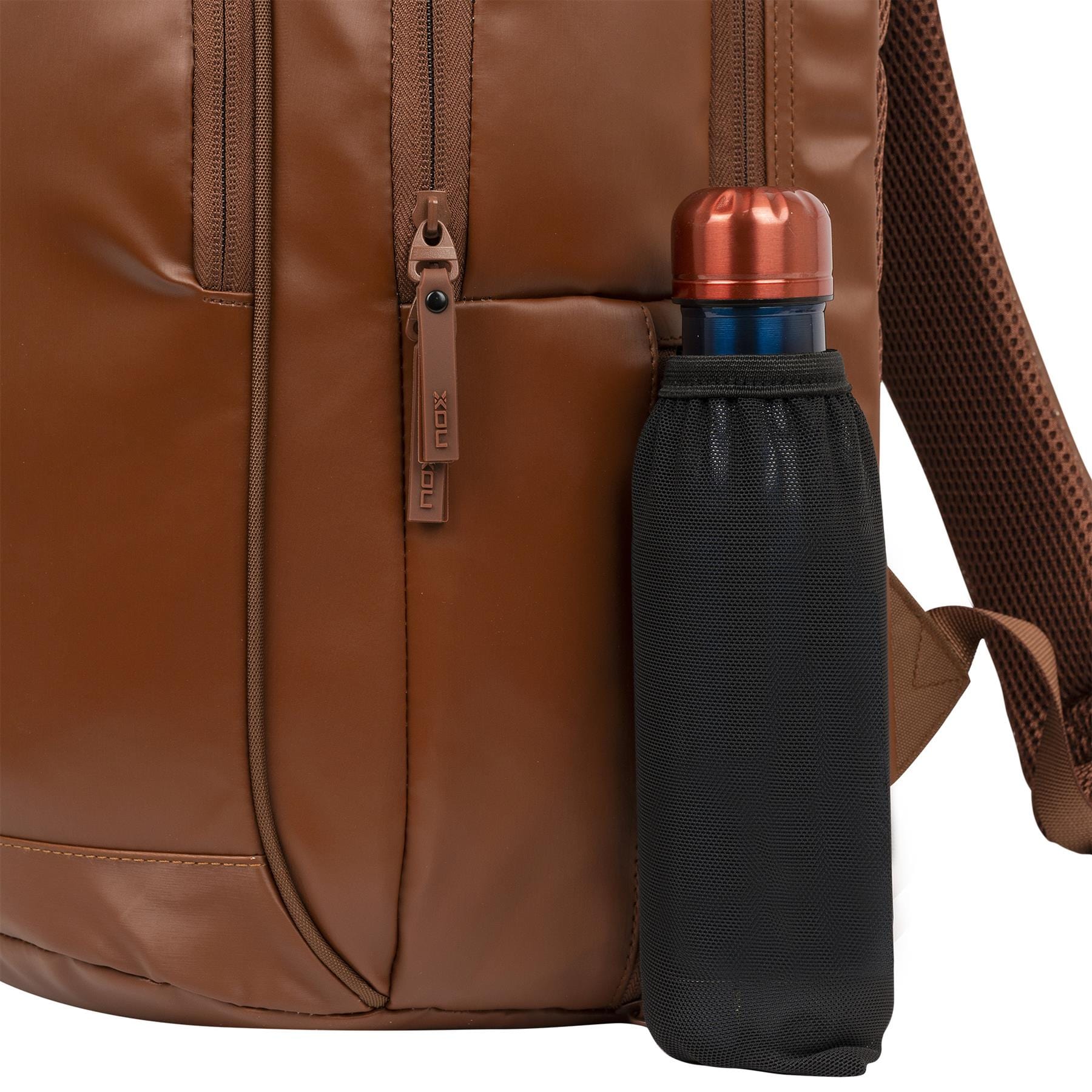 A close-up of the NOX Pro Series Padel Backpack - Camel from NOX, featuring a front zipper pocket and mesh side pocket holding a metallic copper water bottle—ideal for your padel essentials, with air ventilation for freshness.