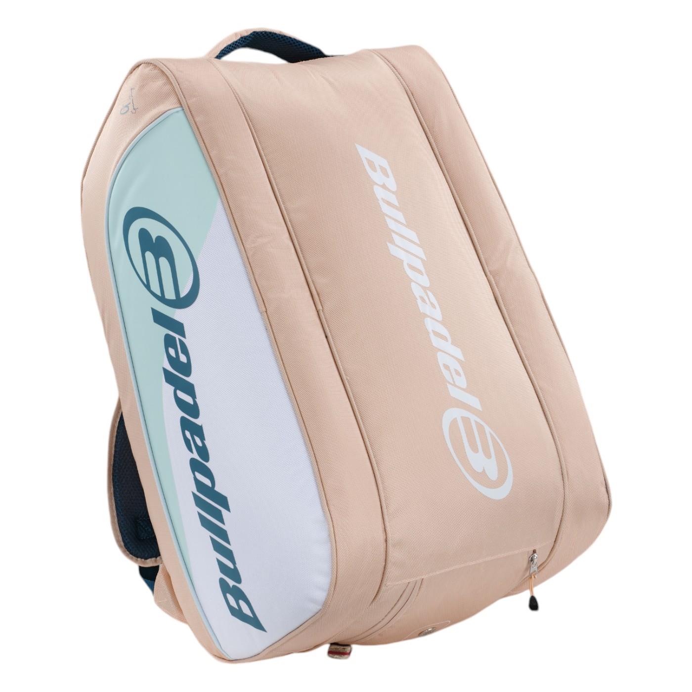 The Bullpadel Elite 25 Padel Racket Bag in pink, approved by Bullpadel athlete Gemma Triay, displays the logo on the front and includes thermo-lined compartments with a secure zipper closure.