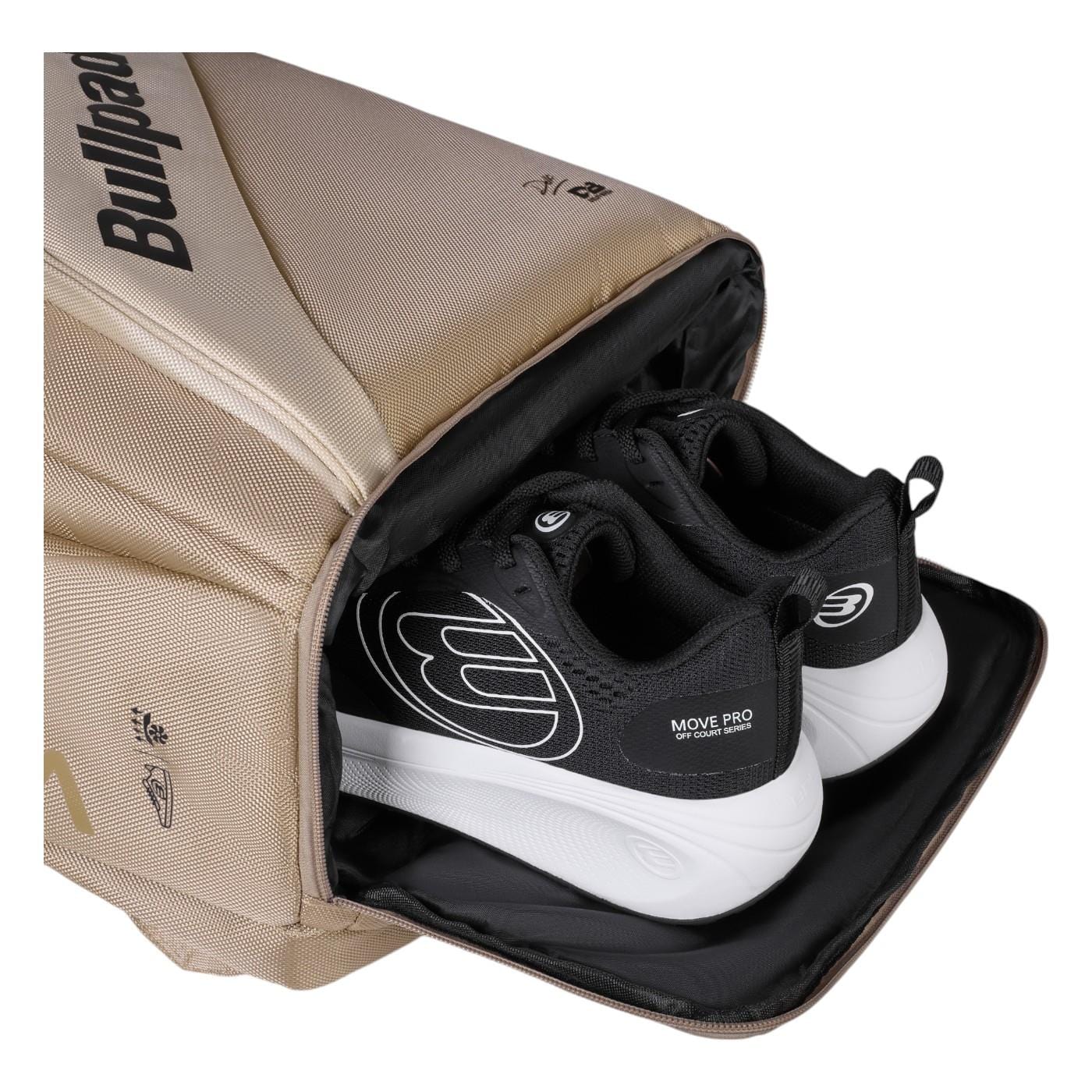A beige Bullpadel Vertex 25 Padel Backpack - Stone, with a reinforced thermo-lined compartment, holds a pair of black and white athletic shoes. Perfect for carrying your Vertex Padel Racket, it features a side zip and logo.