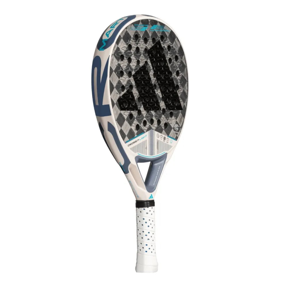 The adidas Cross It Light 3.4 Padel Racket - Chalk White features a stylish black and gray face, white frame, blue accents, and a white grip with black dots—engineered for extra power, superior grip, and dynamic airflow on the court.