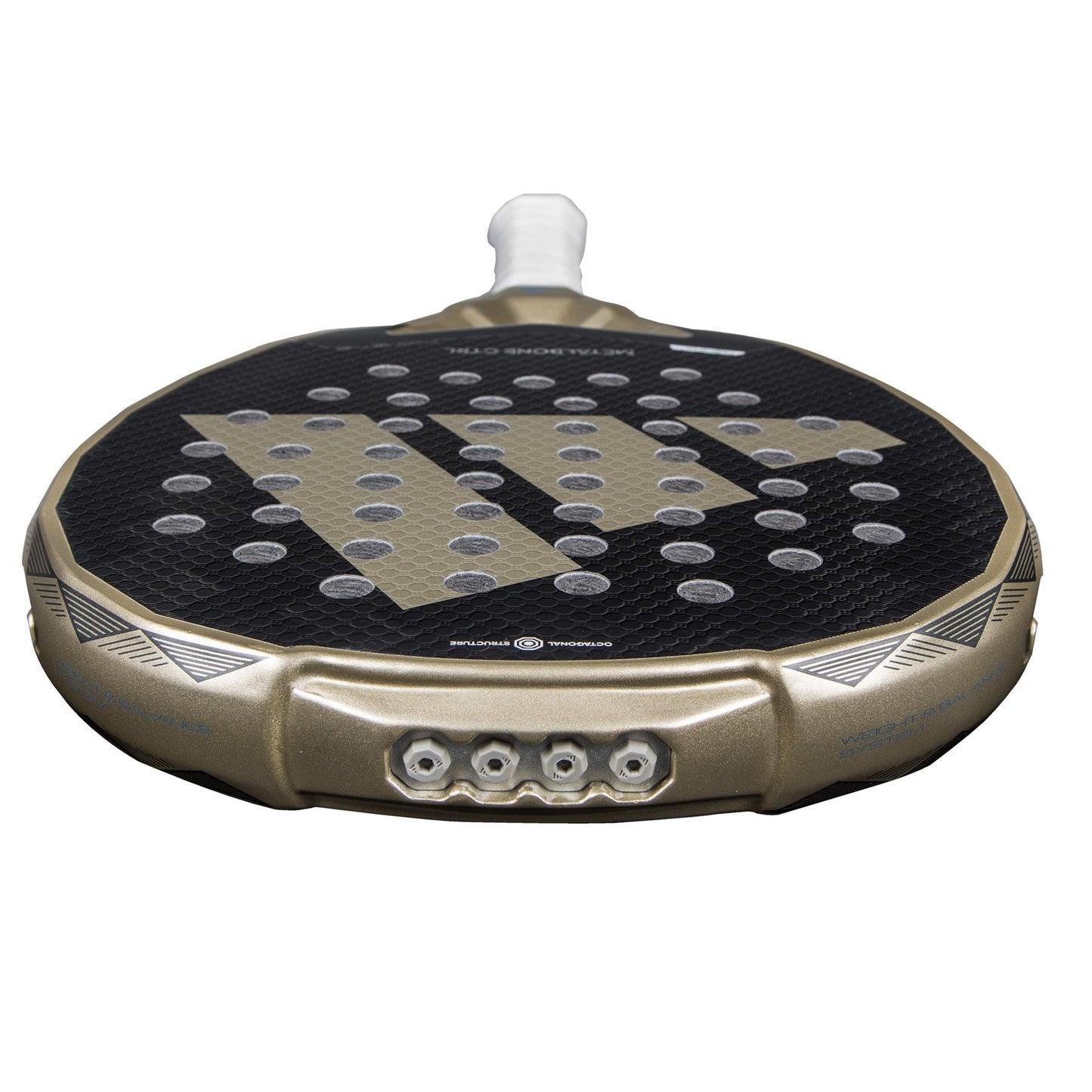 Close-up of the ADIDAS Metalbone CTRL 3.4 Padel Racket - Gold, featuring a gold frame and black face with circular holes, enhanced by an Octagonal Structure. The handle has white grip tape, and the adidas logo is prominently displayed on its surface.