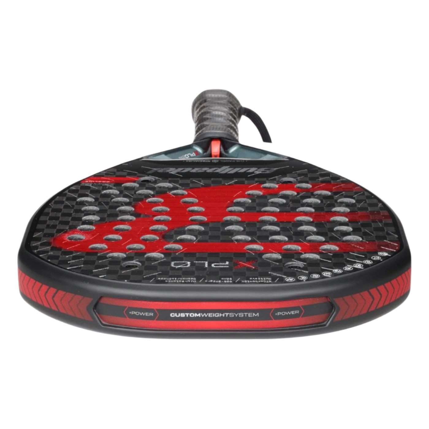 A close-up of the Bullpadel Xplo 2025 Padel Racket - Black / Red showcases its striking honeycomb-patterned face and "Custom Weight System" text along the edge. The textured grip on the handle enhances its sleek, sporty look, making this Bullpadel creation a formidable choice for delivering explosive power.