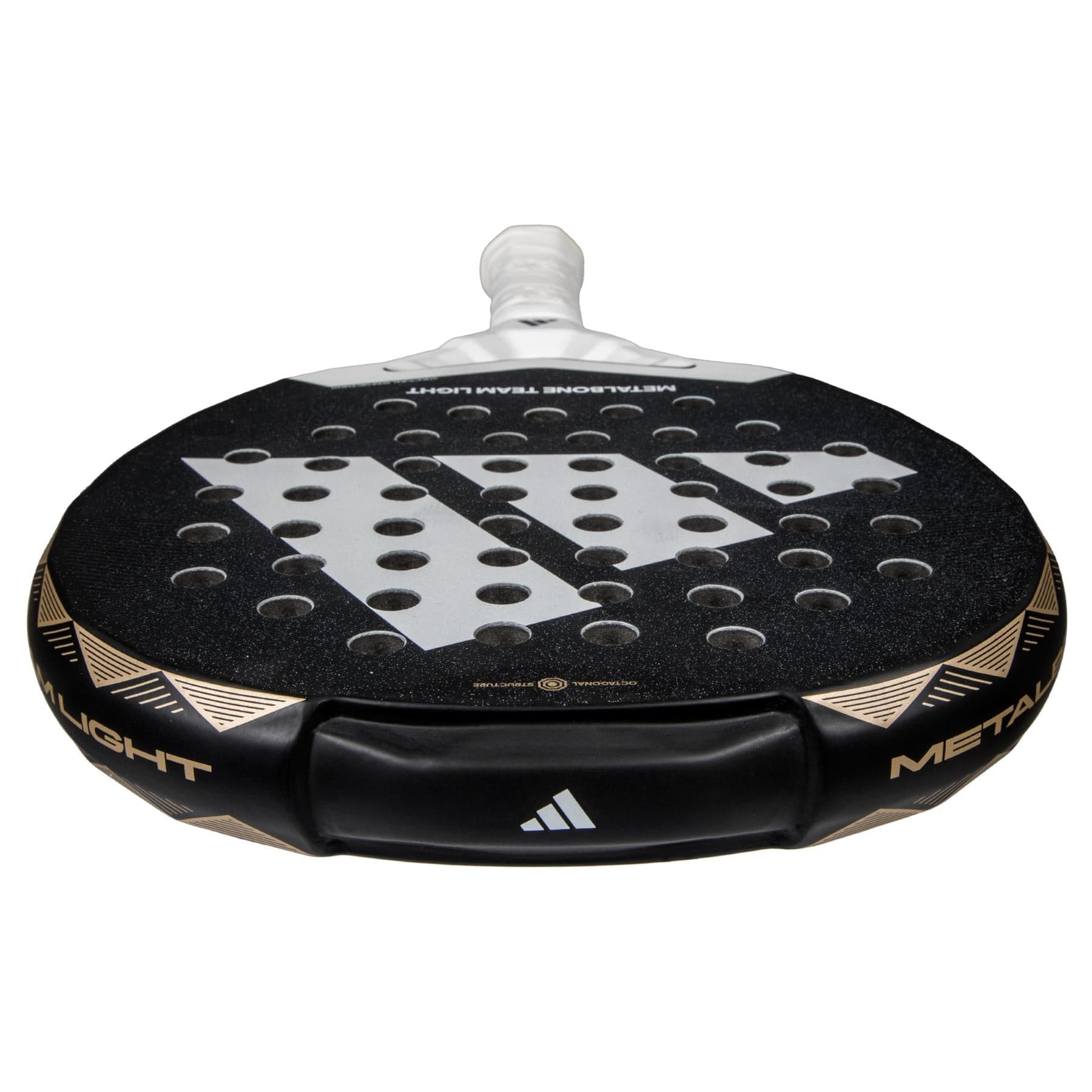 Close-up of a lightweight ADIDAS Metalbone Team Light 3.4 Padel Racket in black and white, featuring a textured surface with circular holes. Designed for advanced players, the handle is white-wrapped, with adidas logos and "Metalbone Team Light" on the edge.