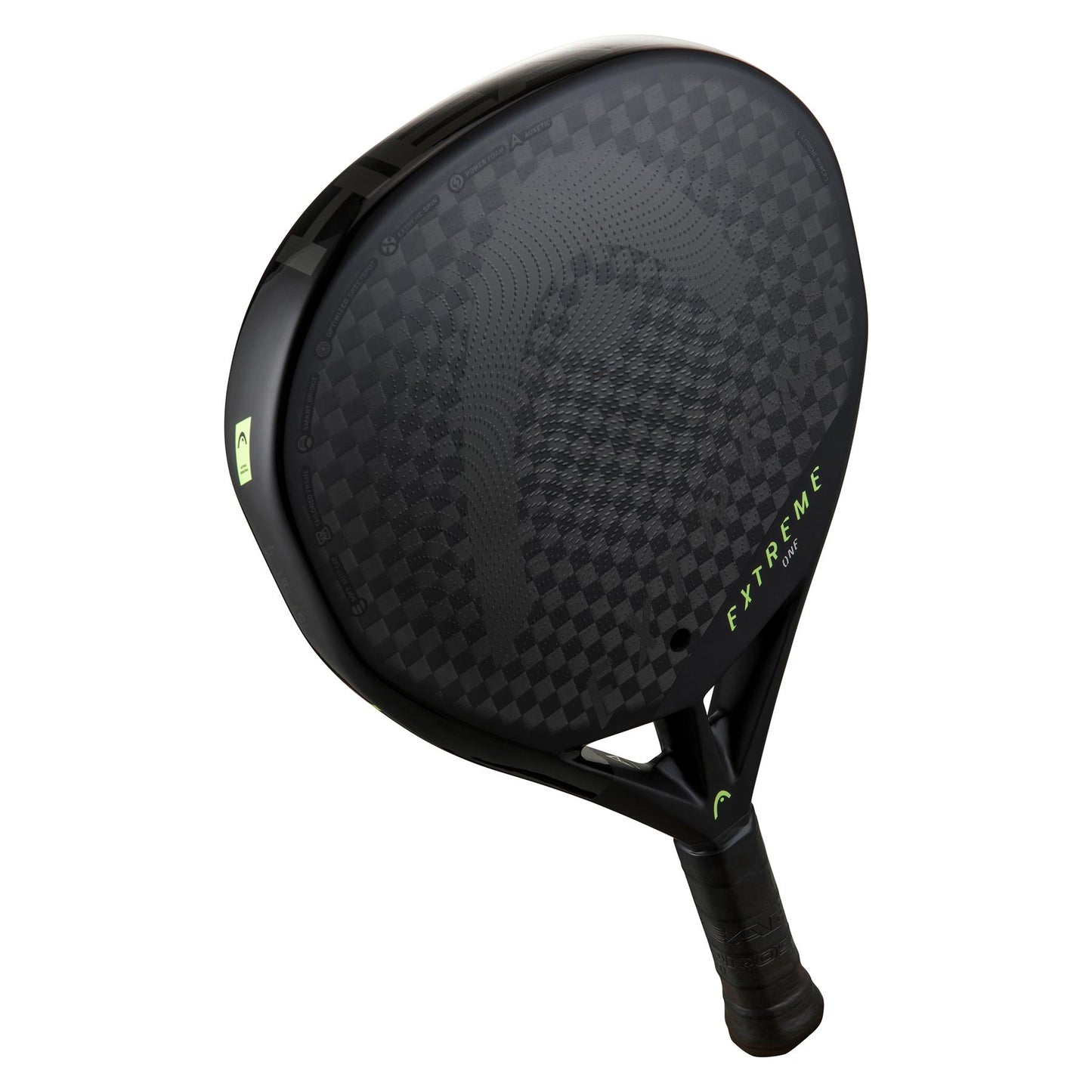 A detailed look at the HEAD Extreme One 2023 Padel Racket - Black reveals its black frame adorned with a 12K carbon checkered pattern and showcases "Extreme" in striking green along the side. Featuring auxetic technology, this racket offers a textured grip handle and exhibits a sleek, modern design.
