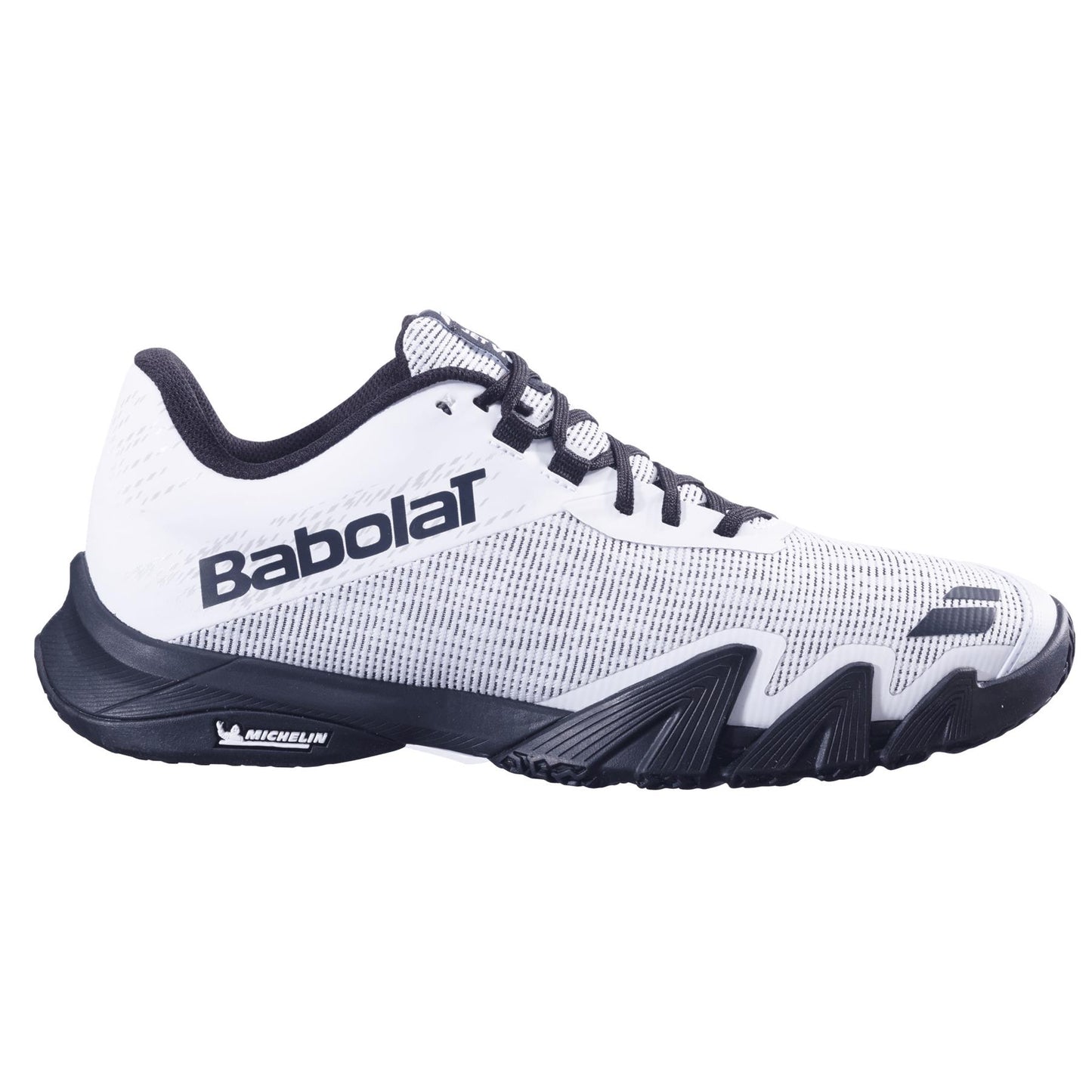 The Babolat Jet Viva Men's Padel Shoes in white/black are ideal for intermediate players, boasting a mesh upper and reinforced sole. "Babolat" appears on the side with "Michelin" near the heel, offering a sleek, aerodynamic profile for superior performance.