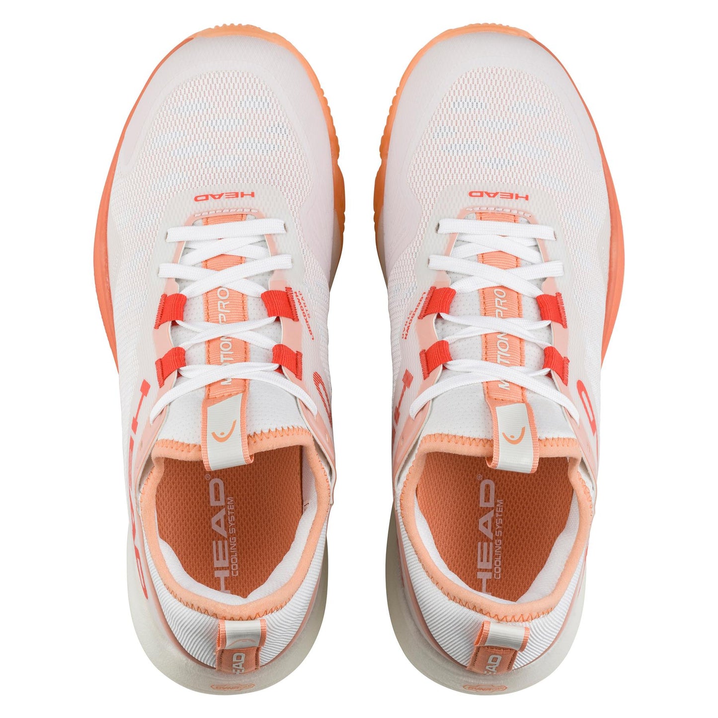 Top view of the HEAD Motion Pro Women's Padel Shoes in White/Coral. These shoes, highlighted by coral on laces and soles, feature DynaFoam cushioning and prominently display the HEAD brand name on the tongue and sides.
