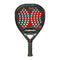 The Bullpadel Xplo 2025 Padel Racket - Black / Red is crafted by Bullpadel for those seeking explosive power, showcasing a sleek black carbon fiber structure with red accents. Adorned with "Bullpadel" and "X-PLO" branding, it features a perforated face, textured handle, and triangular throat area to boost performance.