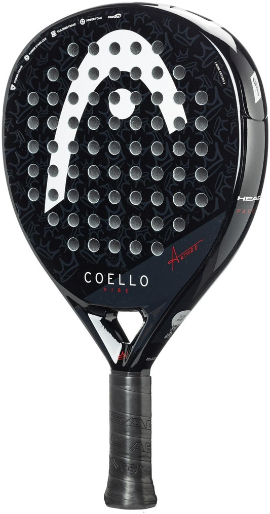 The HEAD Coello Vibe 2025 Padel Racket - Black features a black and white design, Arturo Coello’s signature, circular perforations, a textured surface, “COELLO VIBE” on the face, and a grip-taped handle—great for stylish beginners.
