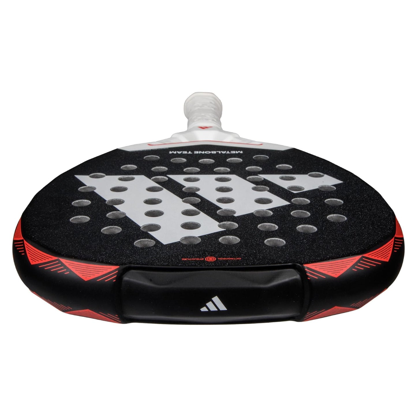 A close-up of an ADIDAS Metalbone Team 3.4 Padel Racket - Black/Red, featuring a textured surface and circular holes. Designed for advanced players, it boasts a white handle, geometric patterns, and the adidas logo in striking black and red tones.