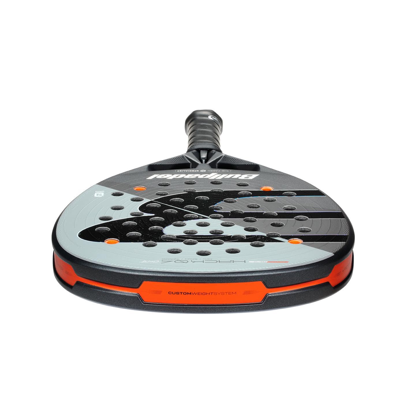 A front view of the Bullpadel HACK 04 Comfort 2026 Padel Racket - Grey features a rounded face with multiple holes, a short handle, and Bullpadel branding that emphasizes its dynamic power.