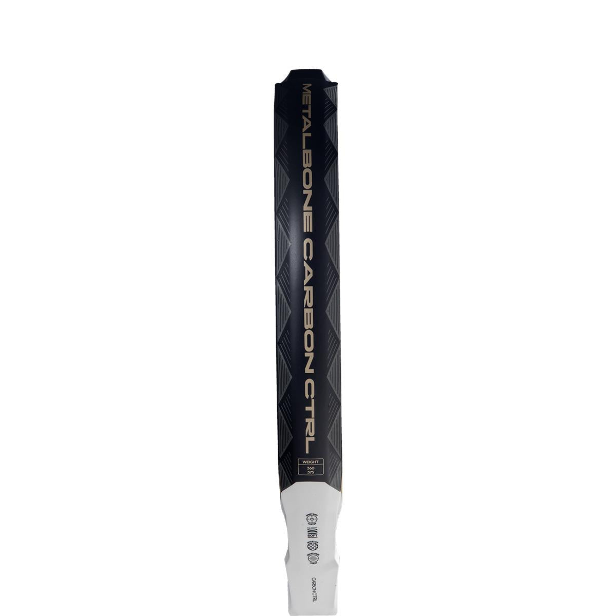Close-up of an ADIDAS Metalbone Carbon CTRL 3.4 Padel Racket handle for advanced players. "Metalbone Carbon Ctrl" is printed on its sleek black and gold surface, featuring a textured pattern.