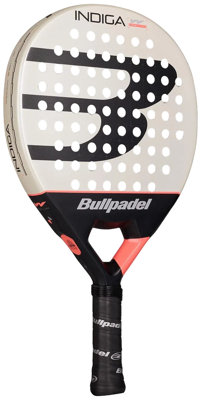 The Bullpadel Indiga W 2026 Padel Racket by Bullpadel features a white and black face with a bold "B" logo, multiple round holes, red accents, a black handle, and offers lightweight performance for agile gameplay.