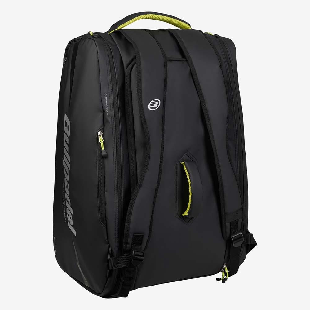 The Bullpadel BPP26022 XPLO Padel Bag in black by Bullpadel, featuring two shoulder straps, a top handle, and yellow zipper accents, is displayed upright against a plain white background.
