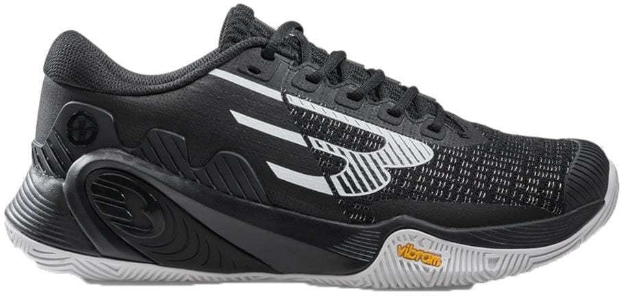The Bullpadel Vertex Vibram 26V Men's Padel Shoes in black feature a stylish logo, textured upper, sculpted black midsole, and a durable gray Vibram outsole—ideal for those seeking reliable padel shoes from Bullpadel.