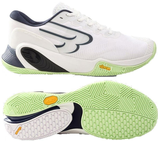 Bullpadel Hack Vibram 26V Men's Padel Shoes in white, with light green textured Vibram outsole, black side design, yellow Vibram logo on the sole, and black detailing. Side and bottom views shown. Brand: Bullpadel.