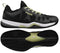 NOX Nerbo Men's Padel Shoes in black with soft lime accents are shown from the side and bottom, featuring a mesh upper, textured sole, Ortholite comfort insole, and NOX branding on the side and heel.