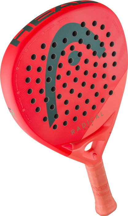 The HEAD Radical Pro 2026 Padel Racket by HEAD features a vibrant orange and green design, circular perforations on the face, and "RADICAL" printed near the lower right—crafted for advanced players seeking ultimate control.