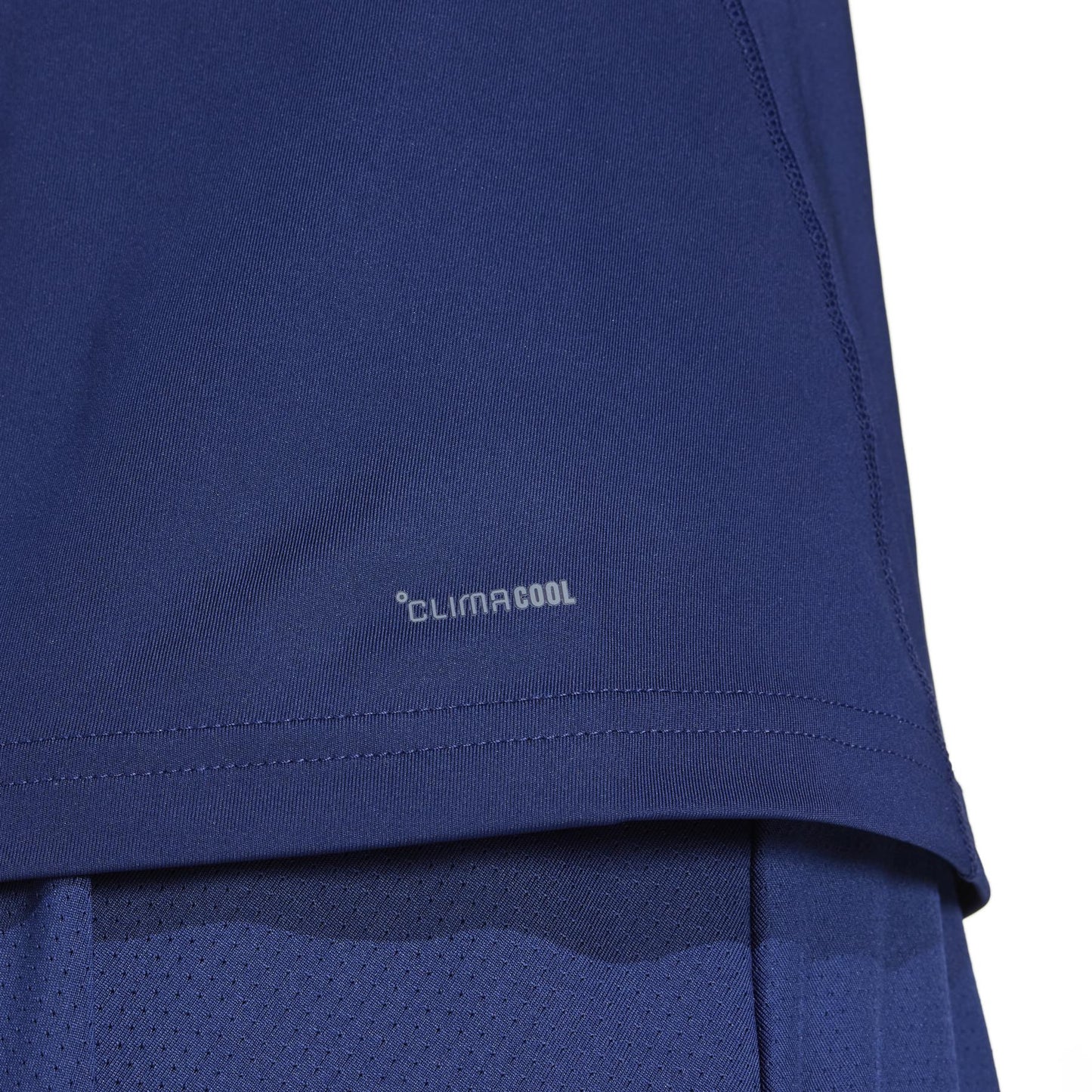 Close-up of the navy adidas Women’s Club Padel Tank Top showcasing a "Climacool" logo at the bottom. Crafted from recycled materials, its lightweight and breathable fabric is ideal for active play.