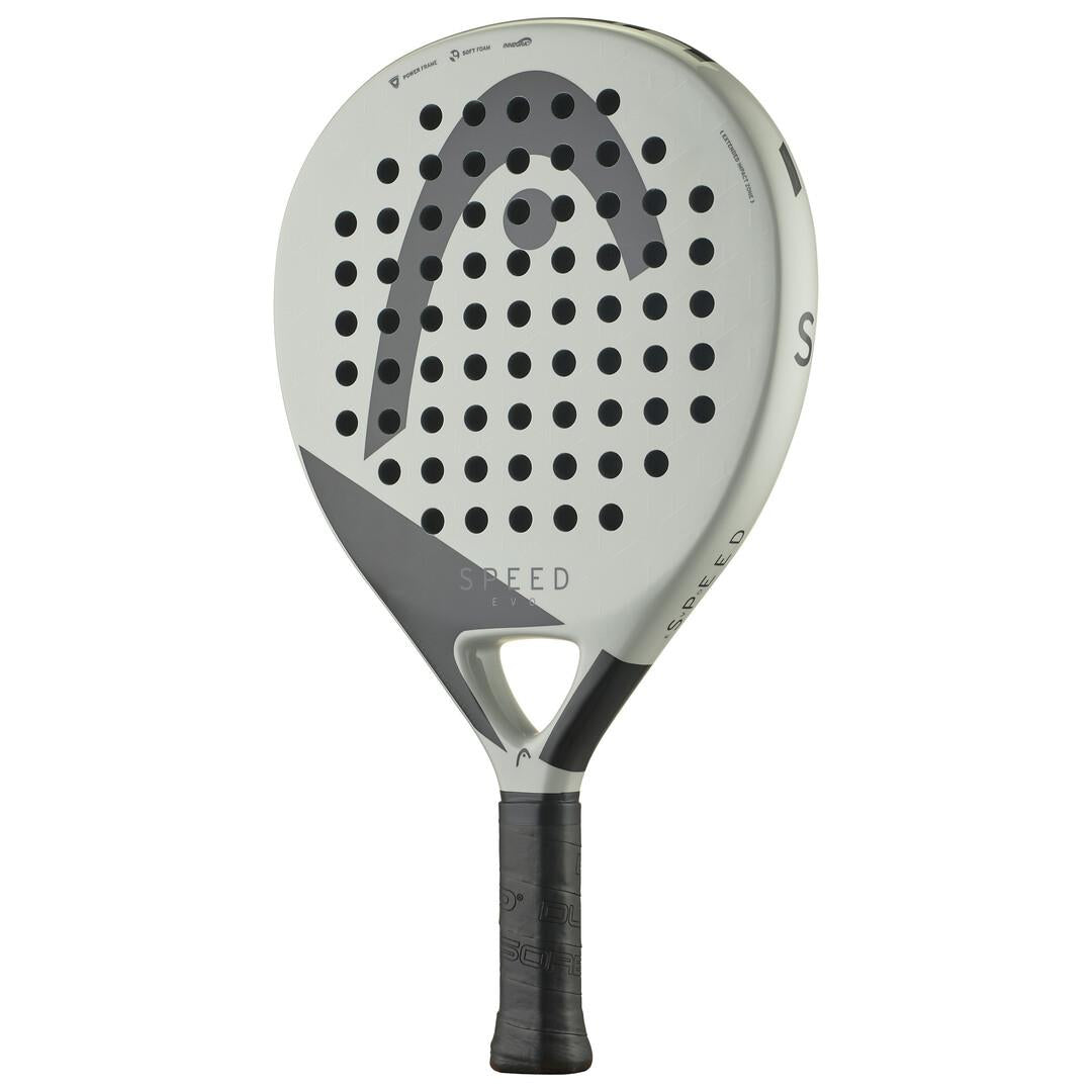 The HEAD EVO Speed 2025 Padel Racket in grey features a sleek design with the brand's logo on the upper half. Crafted for agility, it includes Innegra technology and soft foam cushioning. Its surface has round holes, "SPEED" near the frame's base, and a black grip on its handle.