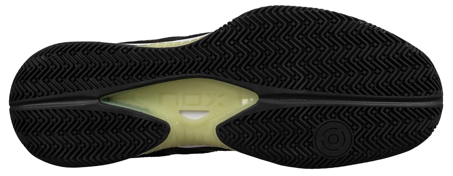The image shows the black, textured rubber outsole of the NOX Nerbo Men's Padel Shoes (Black/Soft Lime) by NOX, featuring a soft lime translucent midsection and circular tread patterns for enhanced grip.