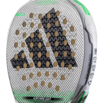 Close-up of the ADIDAS Adipower Light 3.3 Padel Racket, part of the Light series from adidas. Its surface is adorned with a large Adidas logo created by strategically placed holes to enhance control. The frame showcases a gray and green color scheme, with text detailing its specifications.