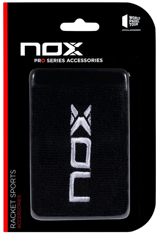 The NOX Padel Wristband - Black / White features a white embroidered logo and Balance Fresh tech for wrist protection. Packaged on black and red "NOX Pro Series Accessories" backing, labeled as World Padel Tour Official Accessories.